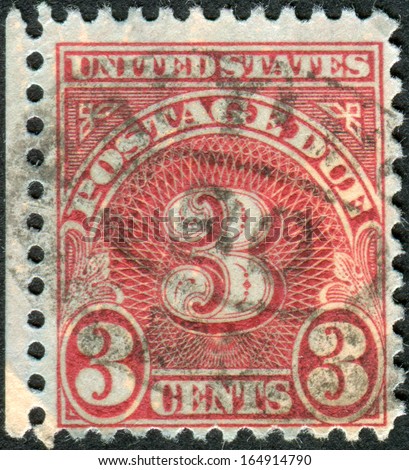 USA - CIRCA 1930: A postage stamp printed in USA, shows figure 3, the price value, circa 1930