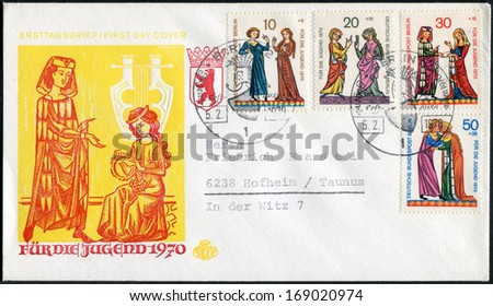 GERMANY - CIRCA 1970: Postage stamp and envelope printed in Germany, shows medieval miniatures of young singers. Envelope and stamp first day used to Surtax for benefit of young people, circa 1970