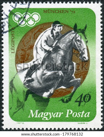 HUNGARY - CIRCA 1973: Postage stamp printed in Hungary, devoted to Summer Olympic Games, in 1972, shows Andras Balczo is a Hungarian modern pentathlete and Olympic champion, circa 1973