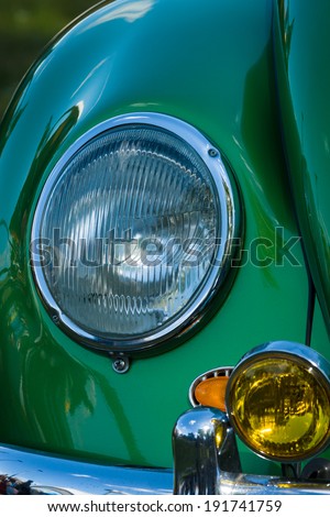 BERLIN, GERMANY - MAY 03, 2014: Headlamp Volkswagen Beetle, closeup. Volkswagen Beetle The most popular car history, produced more than 21 million vehicles.