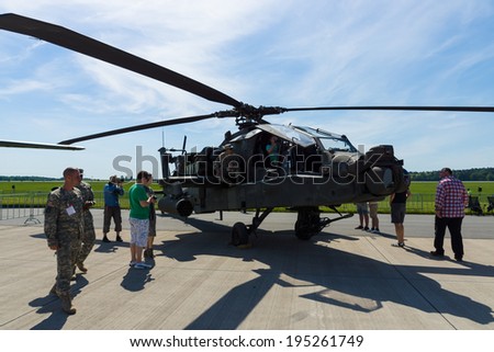 BERLIN, GERMANY - MAY 21, 2014: A four-blade, twin-engine attack helicopter Boeing AH-64 Apache Longbow. US Air Force. Exhibition ILA Berlin Air Show 2014