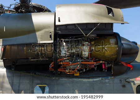 BERLIN, GERMANY - MAY 21, 2014: A turboshaft engine General Electric T64-GE-413 of a heavy-lift cargo helicopter Sikorsky CH-53 Sea Stallion. Exhibition ILA Berlin Air Show 2014