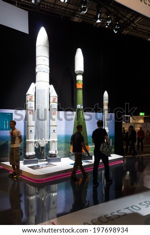 BERLIN, GERMANY - MAY 24, 2014: Models of rockets European Space Agency (Soyuz-2, Vega, Ariane 5) launched from Kourou in French Guiana. Exhibition ILA Berlin Air Show 2014