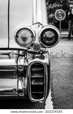 BERLIN, GERMANY - MAY 17, 2014: The rear brake lights of oldtimer Cadillac Series 62 (Fifth generation). Black and white. 27th Oldtimer Day Berlin - Brandenburg