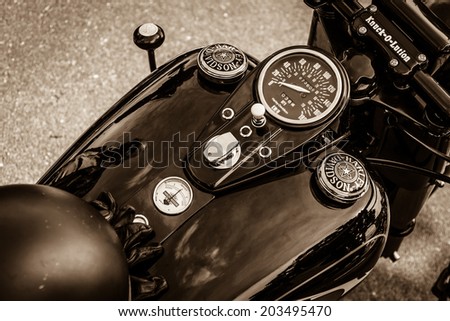 BERLIN, GERMANY - MAY 17, 2014: The dashboard and fuel tank of the motorcycle Harley-Davidson. Sepia. 27th Oldtimer Day Berlin - Brandenburg
