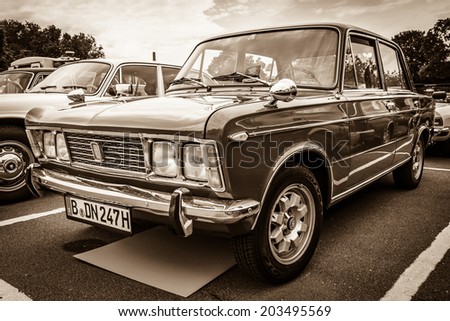 BERLIN, GERMANY - MAY 17, 2014: Large family car Fiat 125S, 1970. Sepia. 27th Oldtimer Day Berlin - Brandenburg