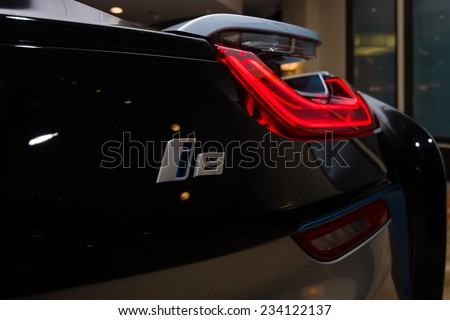 BERLIN - NOVEMBER 28, 2014: Showroom. The rear lights of the car BMW i8, first introduced as the BMW Concept Vision Efficient Dynamics, is a plug-in hybrid sports car developed by BMW.