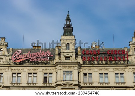 PRAGUE, CZECH REPUBLIC - SEPTEMBER 18, 2014: Facade of an old building with advertising Czech cuisine and beer Budweiser. Prague is the capital and largest city of the Czech Republic.