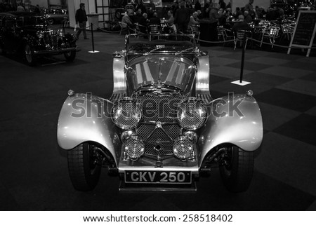 MAASTRICHT, NETHERLANDS - JANUARY 09, 2015: A sports car Jaguar SS100, 3.5, 1937. Black and white. International Exhibition InterClassics & Topmobiel 2015