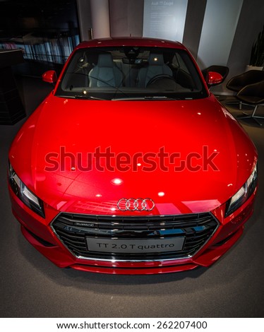 BERLIN - MARCH 08, 2015: Showroom. Sports car Audi TT 2.0 T quattro (2014). Audi AG  is a German automobile manufacturer.