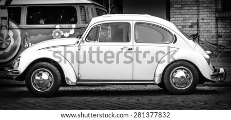 BERLIN - MAY 10, 2015: Subcompact, economy car Volkswagen Beetle. Side view. Black and white. 28th Berlin-Brandenburg Oldtimer Day