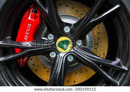 BERLIN - JUNE 14, 2015: The front brake disc of the sports car Lotus Exige S Coupe. The Classic Days on Kurfuerstendamm.