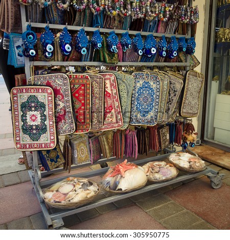 AVSALLAR, TURKEY - JULY 01, 2015: Sale of covers for laptops and tablets. Traditional Turkish ornament. Bazaar. Turkey.