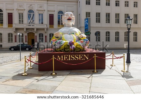 DRESDEN, GERMANY - SEPTEMBER 09, 2015: Chinese idol. Advertising Meissen porcelain. Meissen porcelain is the first European hard-paste porcelain that was developed from 1708.