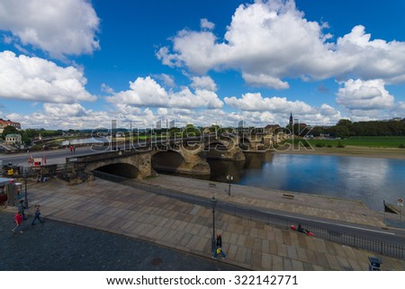 DRESDEN, GERMANY - SEPTEMBER 09, 2015: The oldest bridge over the Elbe - Augustus Bridge. Dresden is the capital city of the Free State of Saxony.