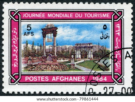 AFGHANISTAN - CIRCA 1984: A stamp printed in the Afghanistan devoted to World Tourism Day. Shows the Victory Monument and Memorial Arch, Kabul, circa 1984