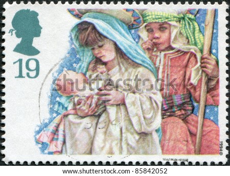 UNITED KINGDOM - CIRCA 1994: A stamp printed in England, shows the School children portraying, Mary, Joseph, with infant Jesus, circa 1994