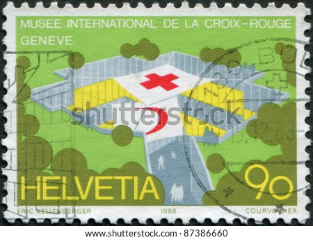 SWITZERLAND - CIRCA 1988: A stamp printed in Switzerland, is depicted Museum International Red Cross and Red Crescent Movement, Geneva, circa 1988
