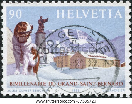 SWITZERLAND - CIRCA 1989: A stamp printed in Switzerland, depicts St. Bernard dog, statue of saint, hospice on summit, circa 1989