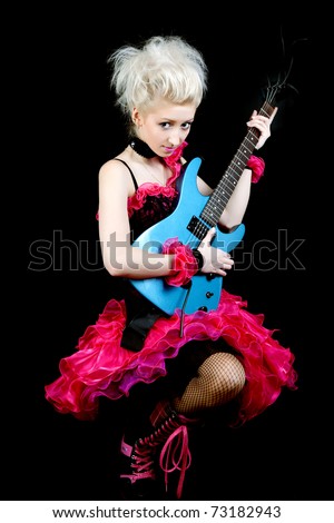 beautiful blonde in black and pink dress with an electric guitar
