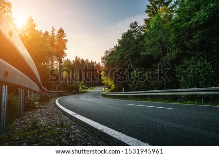 Similar – Image, Stock Photo Curvy road in green forest