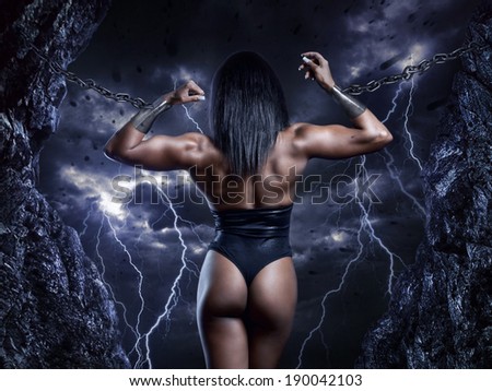 Muscular strong woman prisoner