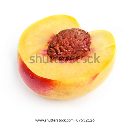 Half of peach isolated on white