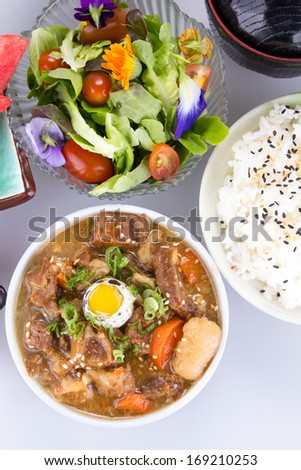 Japanese bento lunch on white background
