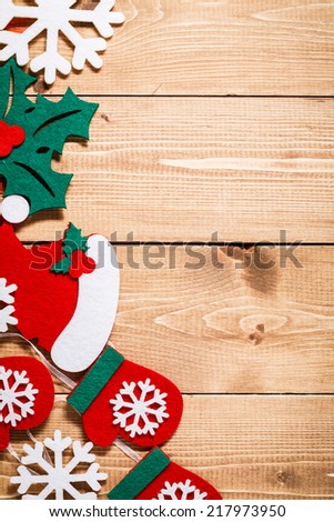 Christmas and New Year decorations on wooden background of aged boards.