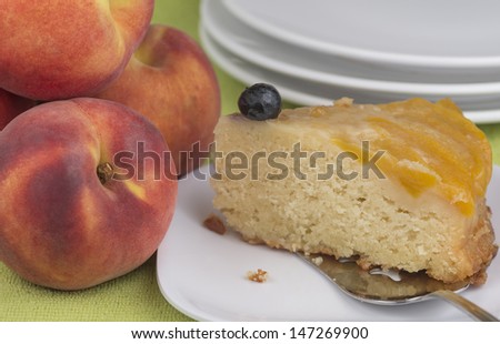 A slice of peach upside down cake