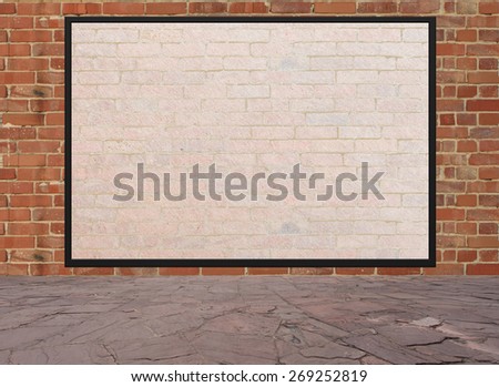 Street scene with Red brick wall and empty billboard