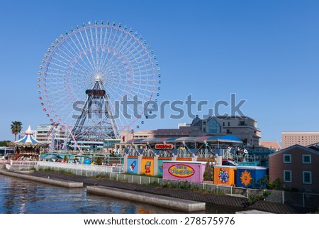 Yokohama, Japan - May 2, 2015: Big wheel at Yokohama\'s Cosmo world amusement park, located in the heart of Yokohama.