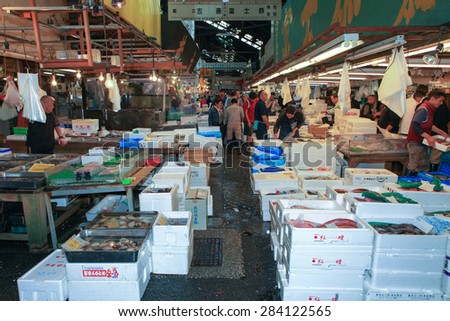 Tokyo, Japan - May 11, 2015: Famous Tsukiji fish market shops. Tsukiji is the biggest fish market in the world, with a vast varaiety of Fish and sea food