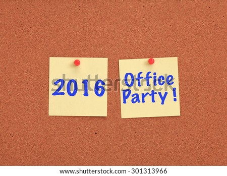 Cork board with 2016 office party written on two yellow notes