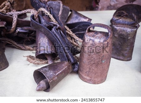 Image, Stock Photo Copper bells, different sizes on a wooden stick