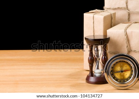 parcel wrapped packaged box isolated on black background