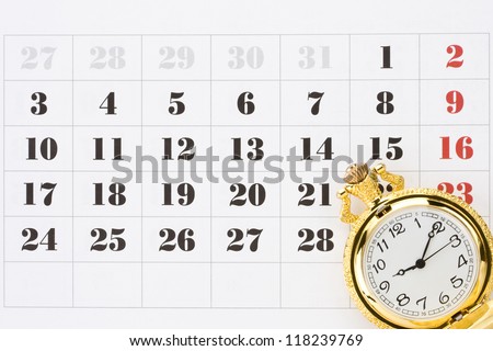pocket watch on calendar background