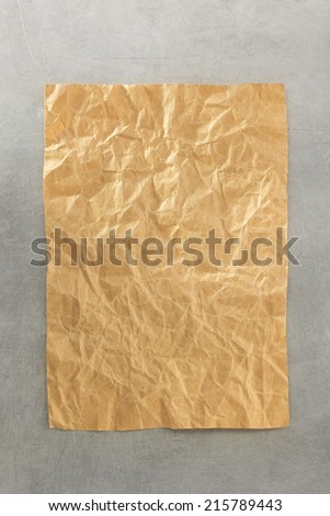 wrinkled paper at metal background texture