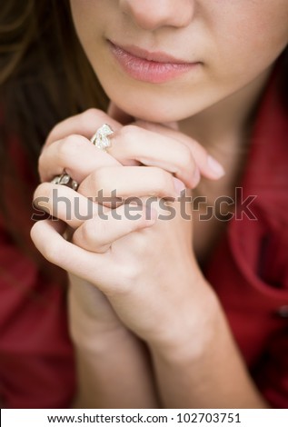 Praying hands: Closeup shot of a beautiful young woman hands in prayer