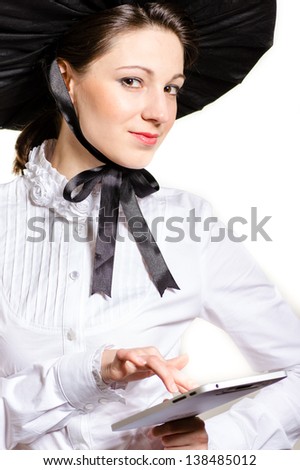 Portrait of a happy young victorian business woman using notebook PC happy smiling