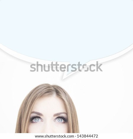 Young thoughtful business woman looking up at ideas sign & symbols on white background