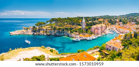 Similar – Amazing blue lagoon with cliff archway