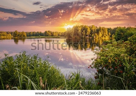 Similar – Foto Bild Ruhiger See, umgeben von Bergen mit Herbstbäumen bei Sonnenuntergang