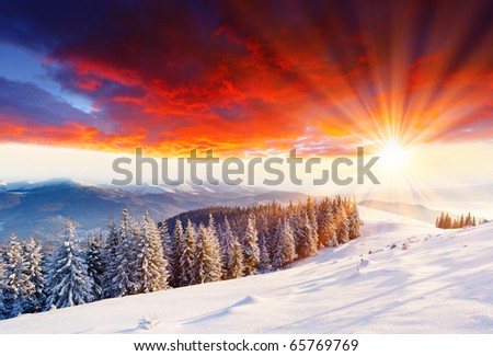 Majestic sunset in the winter mountains landscape. HDR image