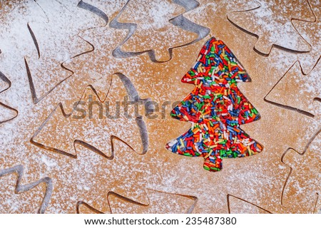 The process of baking cookies at home . Background of gingerbread cookies