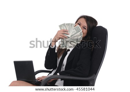 girl with net-book and money in chair