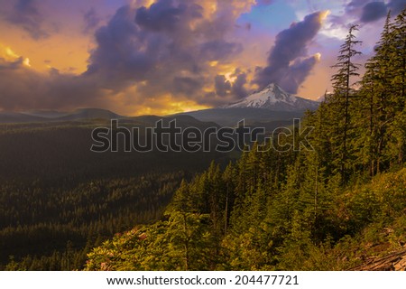 Majestic Sunset View of Mt. Hood with drmatic skies during the summer months.