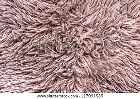 Gray shaggy carpet as texture