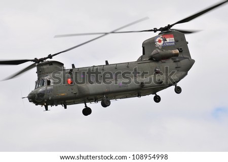 FAIRFORD, UK - JULY 8: Royal Air Force Chinook aircraft participates in the Royal International Air Tattoo airshow event July 8, 2012 near Cirencester, England.