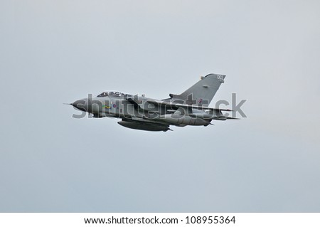 FAIRFORD, UK - JULY 8: Royal Air Force Tornado aircraft participates in the Royal International Air Tattoo airshow event July 8, 2012 near Cirencester, England.
